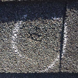 Hail Damage To Roof Shingle