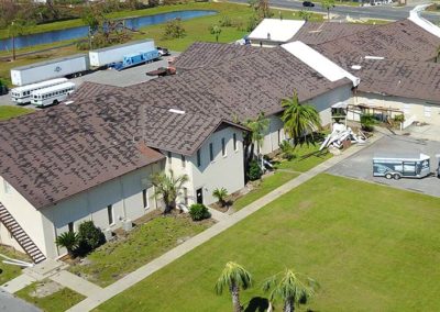 Hurricane Damage to Church Roof Stripped Shingles