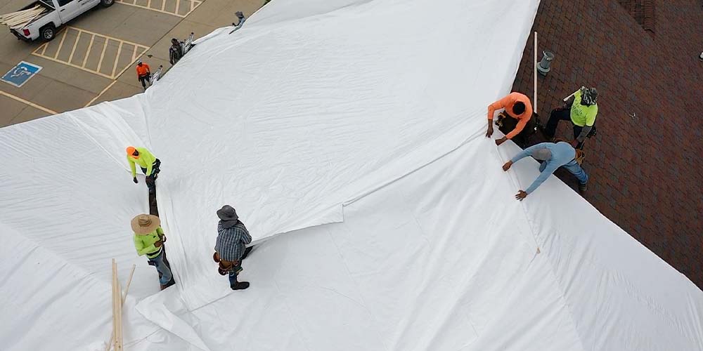 Installing Roof Shrink Wrap Installing Roof Shrink Wrap