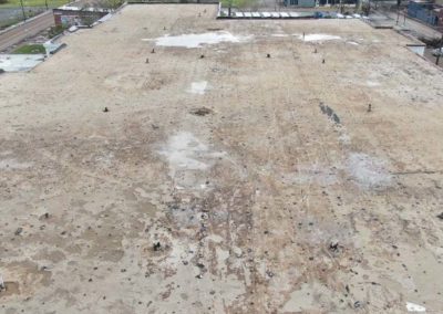 Flat Roof Insulation Stripped Bare by Wind