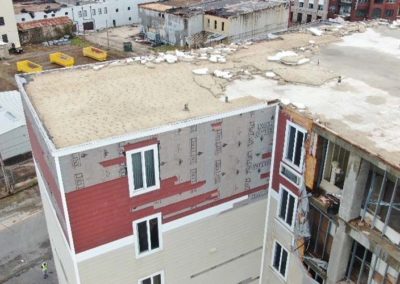Flat Roof Building Shredded After Hurricane