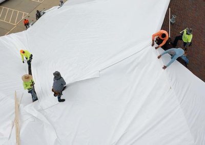 Shrink Wrap Roof Installation Crew